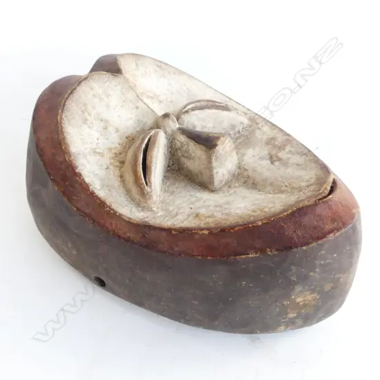 A vintage Gabon African Kwele carved mask,